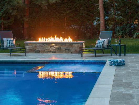 Marble Terrace and Fire Feature by Boston landscape professional Onyx Corporation